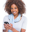 Cheerful woman typing a text message