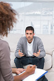 Man speaking to a therapist
