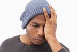Depressed man in beanie hat