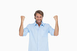 Smiling man in shirt cheering