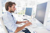 Designer sitting at his desk and working