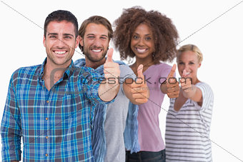 Happy stylish group giving thumbs up