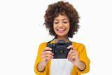 Attractive girl holding a camera