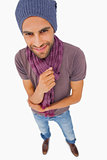 Happy man wearing beanie hat and scarf