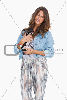 Happy woman with her puppy