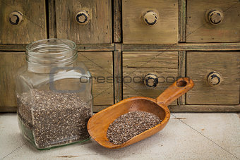 jar and scoop of chia seeds