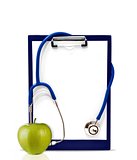 Stethoscope and green apple