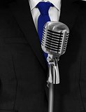 Man in suit with retro microphone