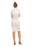 Full length portrait of business woman. rear view