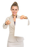Smiling business woman giving documents and pen for sign