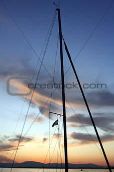 Sailboat mast at sunset