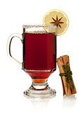 Hot mulled wine with lemon slice and cinnamon