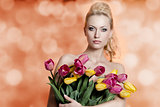sensual woman with colourful tulips 