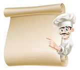 Chef pointing at menu