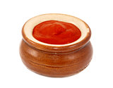 Tomato ketchup served in a small ceramic pot