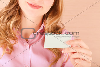 Business woman holding her visiting card