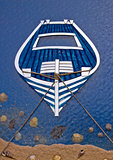 Wooden boat and beach symbol