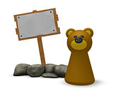 bear and blank wooden sign