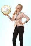 business woman with coin in hand