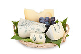 Various types of cheeses and grape