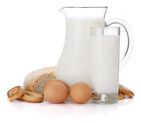 Milk jug, glass, eggs and bread