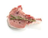 Raw meat with rosemary and pepper