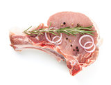 Raw meat with rosemary, pepper and onion