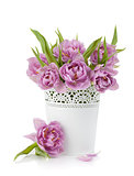 Pink tulips in metal flowerpot
