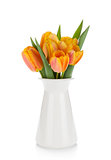 Orange tulips bouquet in flowerpot
