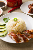 singapore roasted chicken rice  with chili sauce as background