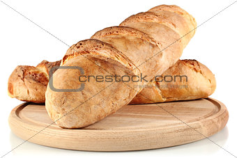 homemade bread on wooden breadboard
