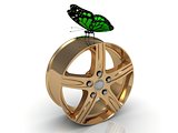 Green butterfly sits under the gold rims