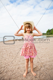 Smiling young girl at beach