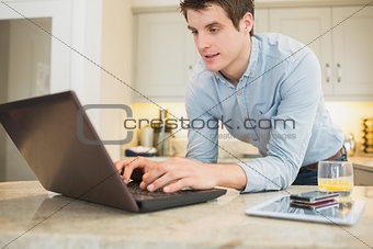 Enthusiastic man surfing the internet