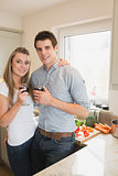 Couple drinking wine in the kitchen