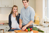 Man cooking for his pregnant wife
