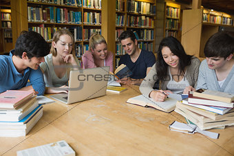 Students learning in a library