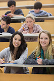 Smiling students in a lecture