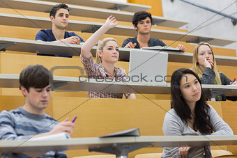 Students having a lesson in the lecture hall