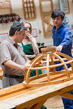 Woodwork class talking about a structure