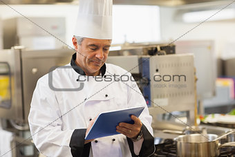 Chef using his digital tablet