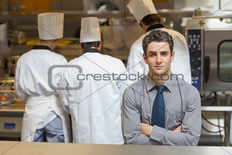 Waiter standing in the kitchen