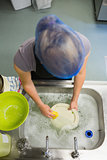 Overhead view of  woman washing the dishes