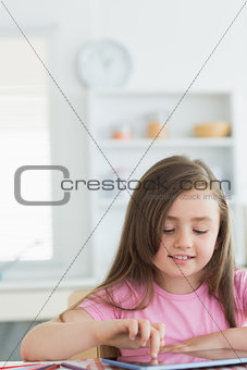 Little girl using tablet