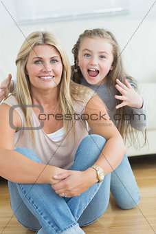 Little girl about to scare her mother