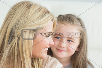 Laughing mother and daughter
