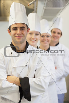 Chefs in line smiling
