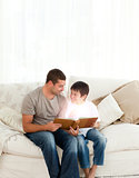 Father and son reading a fairy tale