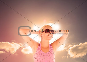 Blonde woman enjoying sunbathing