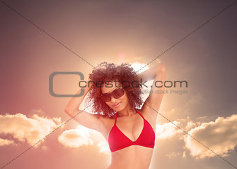 Brunette enjoying sunbathing in bikini